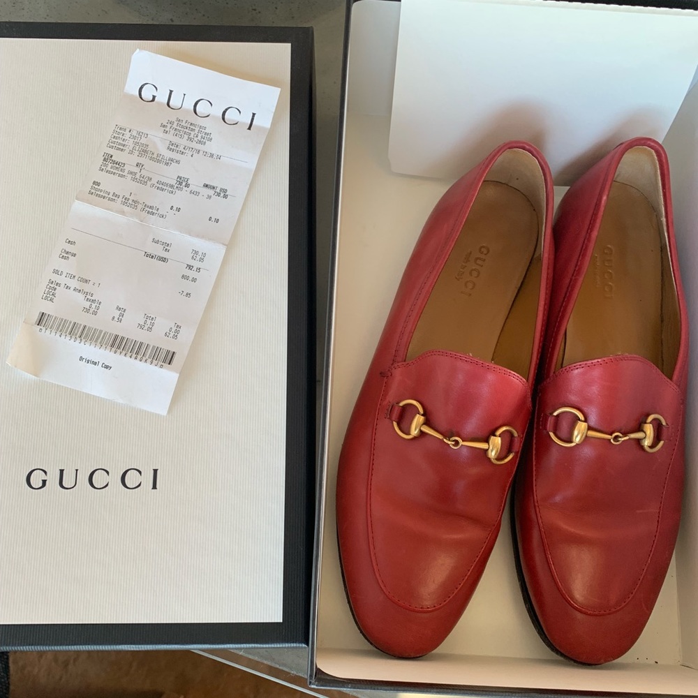 Red Gucci flats.